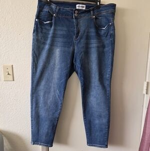 Disclosure High-Rise Slim Jeans in Medium BlueDisclosure High Rise Double Button